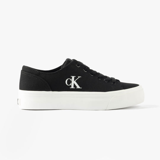 Calvin Klein VULC FLATFORM LOW Womens Trainers Black/Bright White side view featuring black canvas upper and white sole.