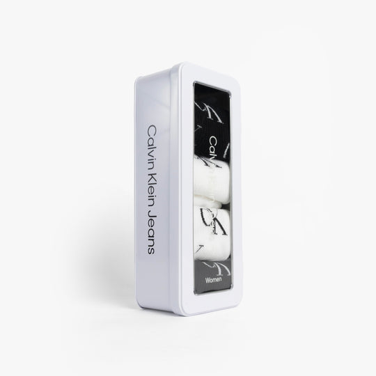 Calvin Klein 4 Pack Giftboxed Trainer Womens Crew Socks Black/White side view packaging with brand logo.