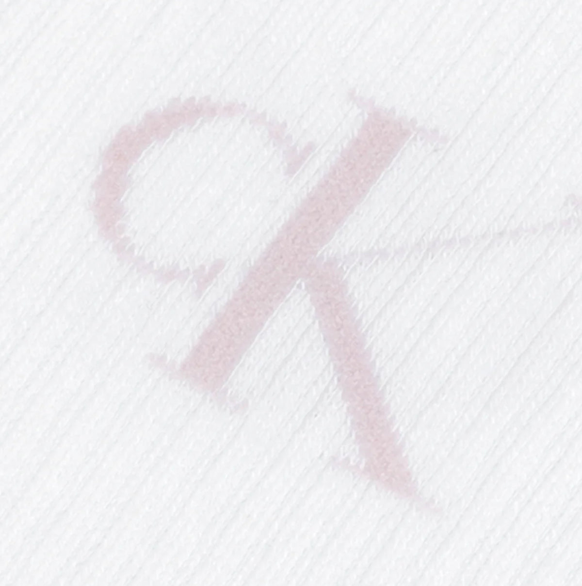 Calvin Klein 4 Pack Giftboxed Trainer Womens Crew Socks Lilac Combo close-up detail view showing logo on soft fabric.