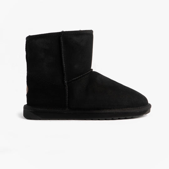 EMU Australia STINGER MINI Womens Sheepskin Boot Black side view showing shearling material and round toe shape