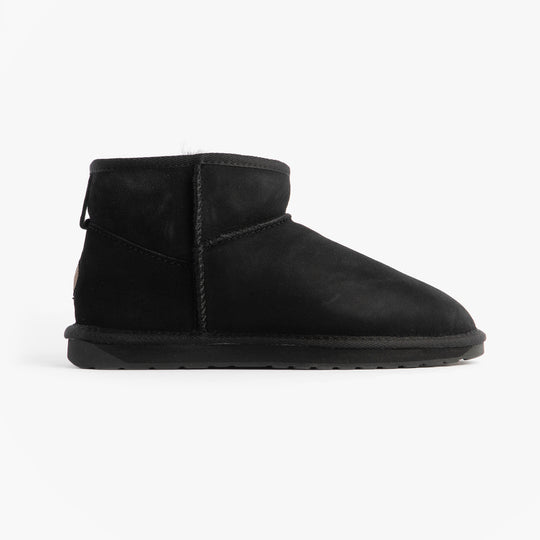 EMU Australia STINGER MICRO Womens Sheepskin Boot Black side view showcasing sheepskin upper and rubber sole.