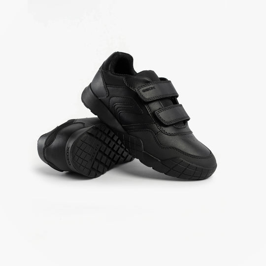 GEOX J RANN-E BOY Unisex Kids Touch Fasten Trainers Black side view showing black synthetic upper and touch fasten straps