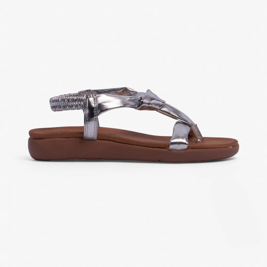 Heavenly Feet BUTTERCUP Womens Sandals Silver side view showcasing synthetic upper and low heel.