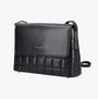 Hush Puppies GOMATHIE Womens Black side view of crossbody bag in faux leather with zip closure.