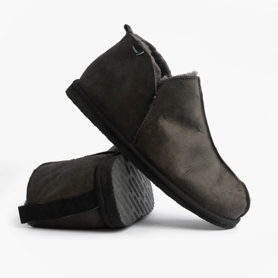 Shepherd ANTON Mens Slippers Matt Black side view showcasing leather/suede upper and rubber sole.