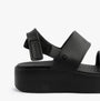 Skechers 111257/BBK ARCH FIT UPBEAT - SUNRISE Womens Sandals Black side view showcasing lightweight platform design.