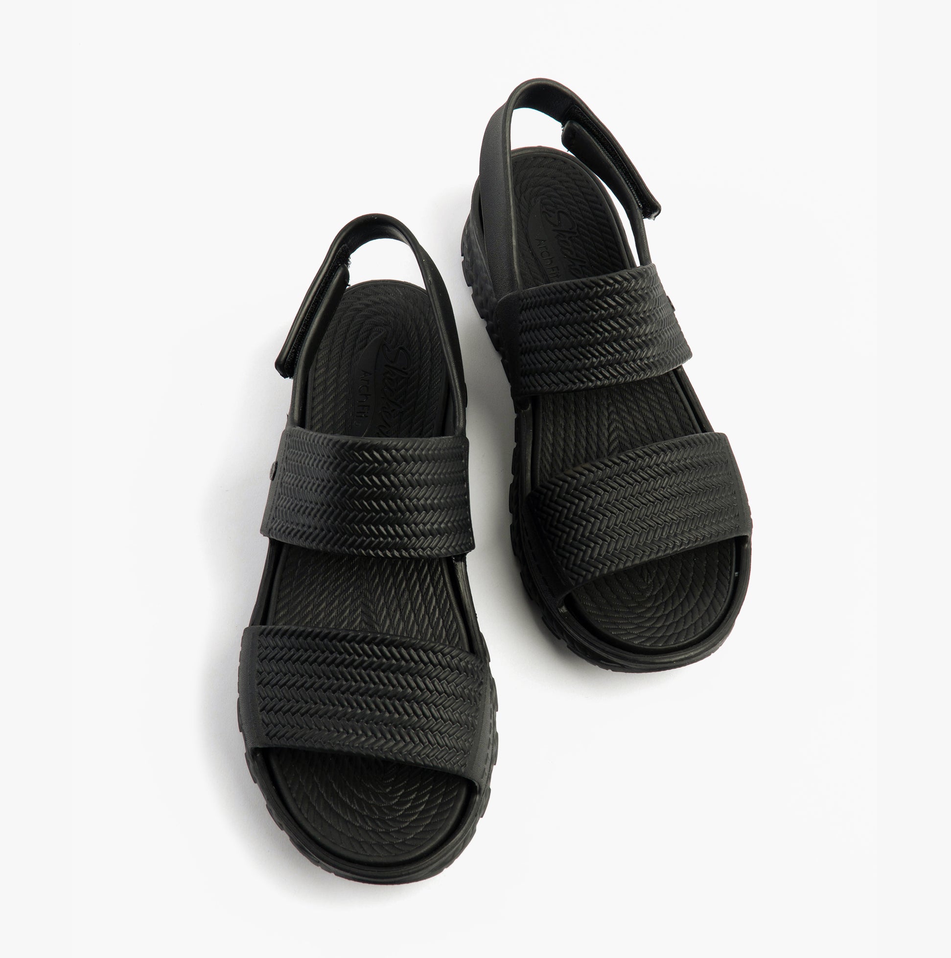 Skechers 111461/BBK ARCH FIT FOOTSTEPS - SUNNY DAYS Womens Sandals Black top view with adjustable straps.
