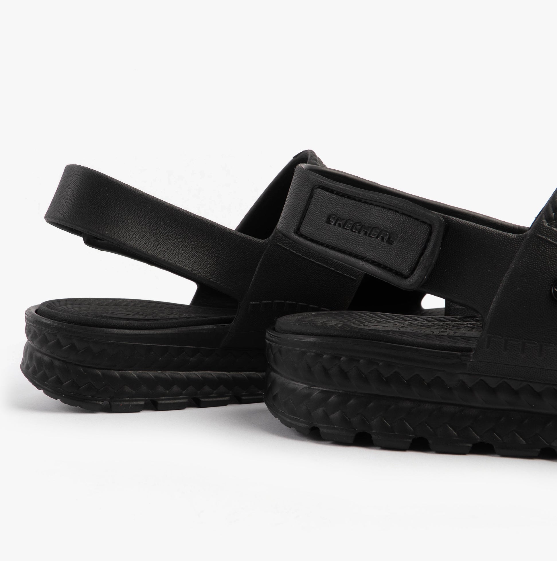 Skechers 111461/BBK ARCH FIT FOOTSTEPS - SUNNY DAYS Womens Sandals Black side view showcasing synthetic material and touch fasten.