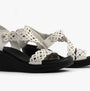 Skechers 119617/WHT RUMBLE ON - SASSIER DAYZ Womens Sandals White side view detailing the synthetic leather upper and wedge heel.