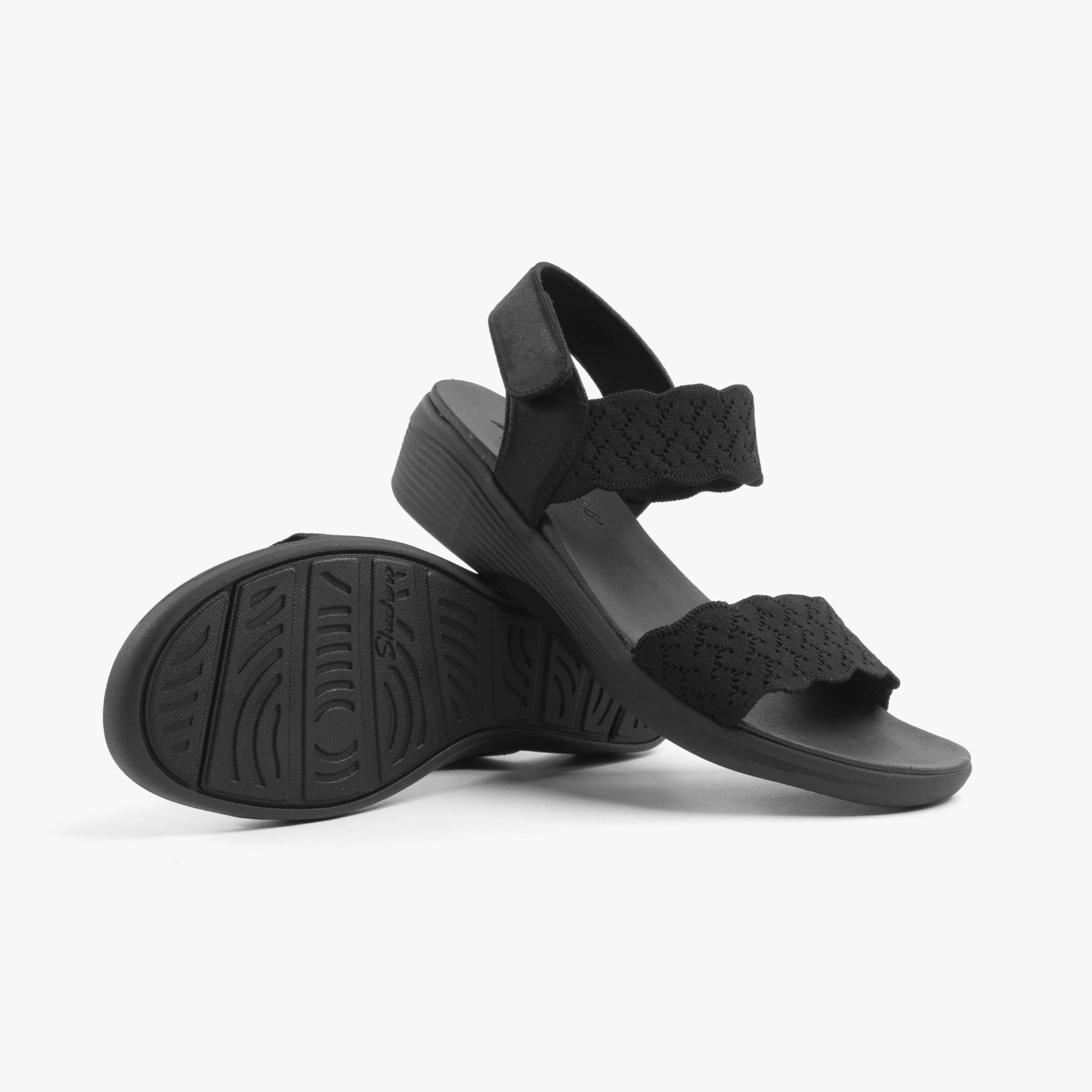 Skechers 163165/BBK ARYA - ON THE RISE Womens Sandals Black side view with wedge heel and textured straps.