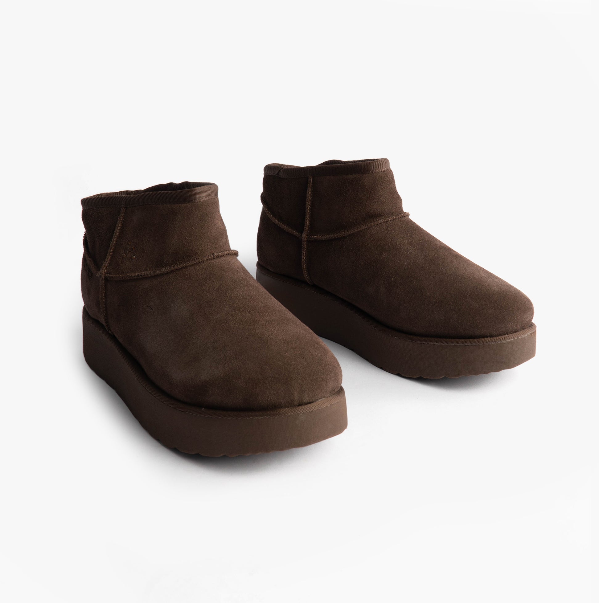 Skechers 169143/CHOC KEEP COZY Womens Boots Chocolate side view showcasing faux leather and shearling design.
