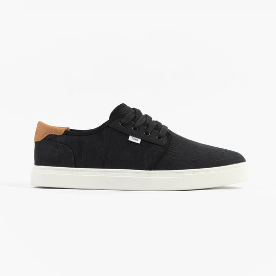 TOMS CARLO 2.0 Mens Trainers Black side view featuring black canvas upper and rubber sole.