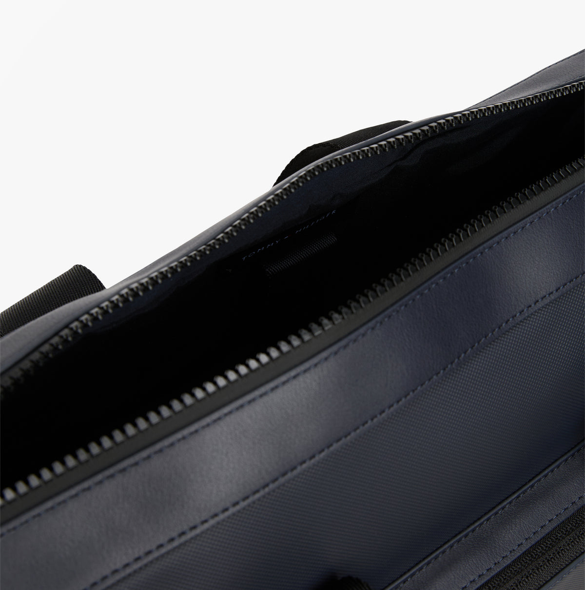 Tommy Hilfiger Signature Laptop Bag Navy detail view of zip closure and interior.