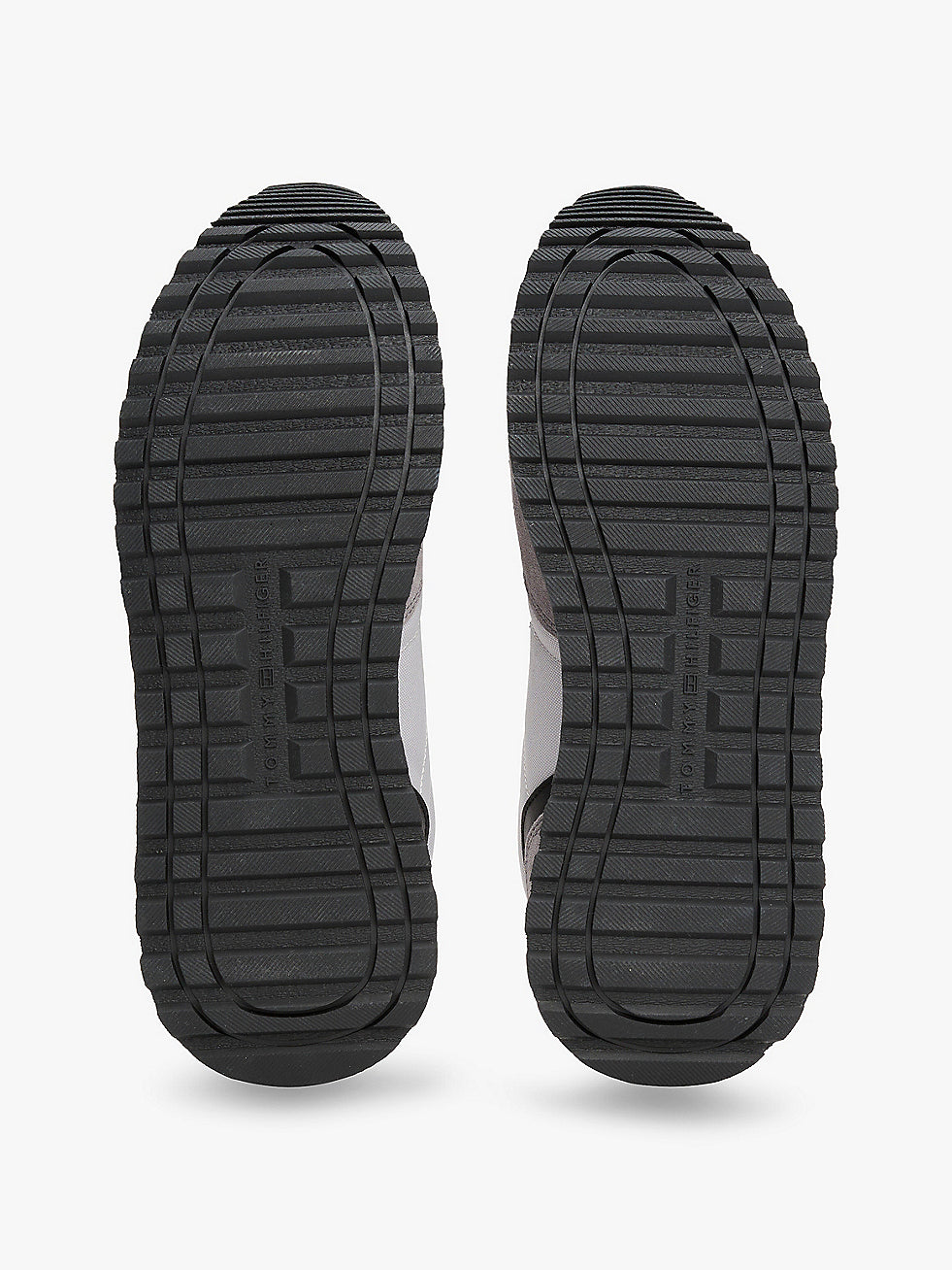 Tommy Hilfiger NEW RUNNER EVA MIX Mens Trainers Grey Whisper shoe sole view showcasing rubber outsole details.