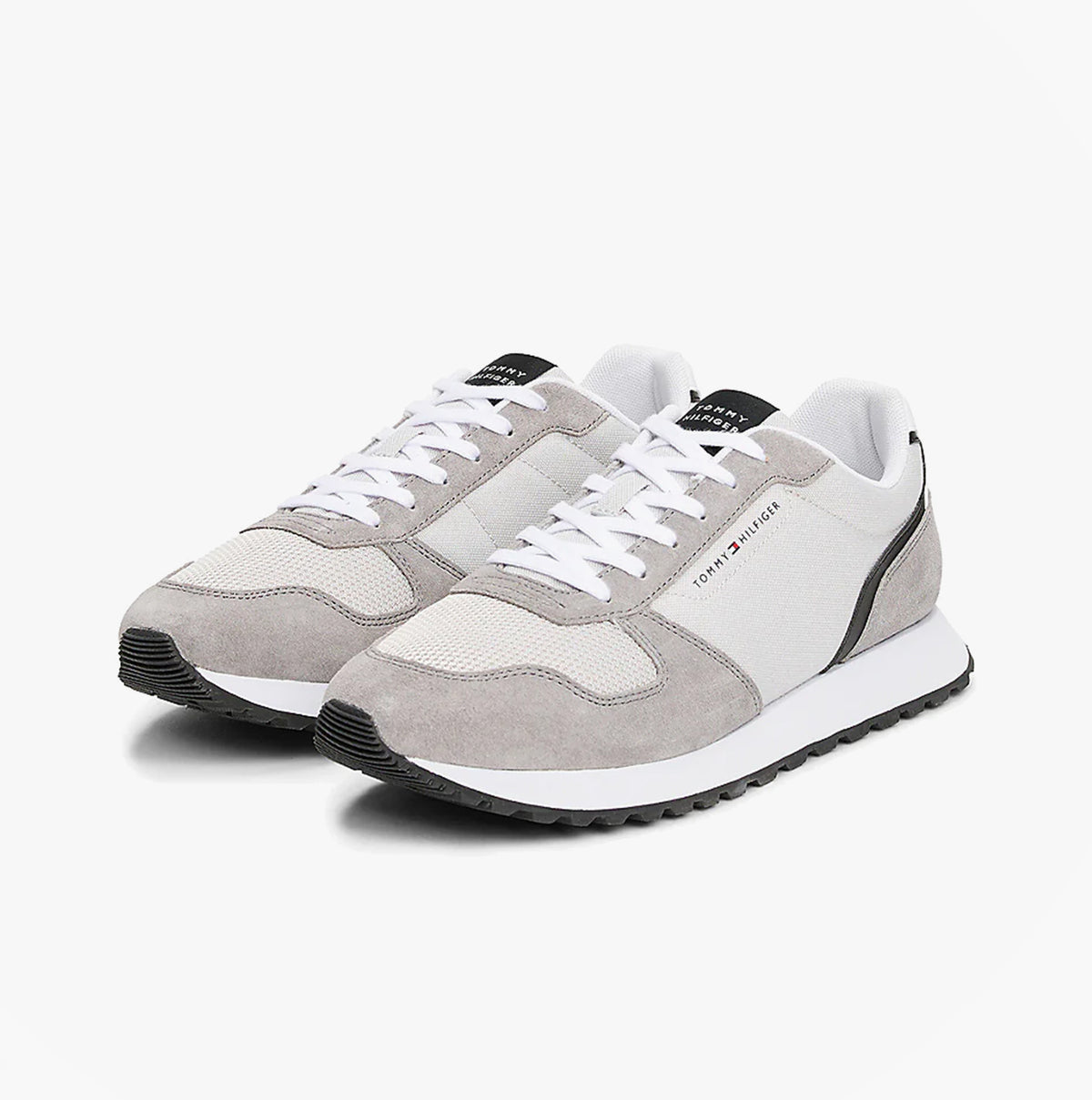 Tommy Hilfiger NEW RUNNER EVA MIX Mens Trainers Grey Whisper side view showing lace-up design and suede upper.