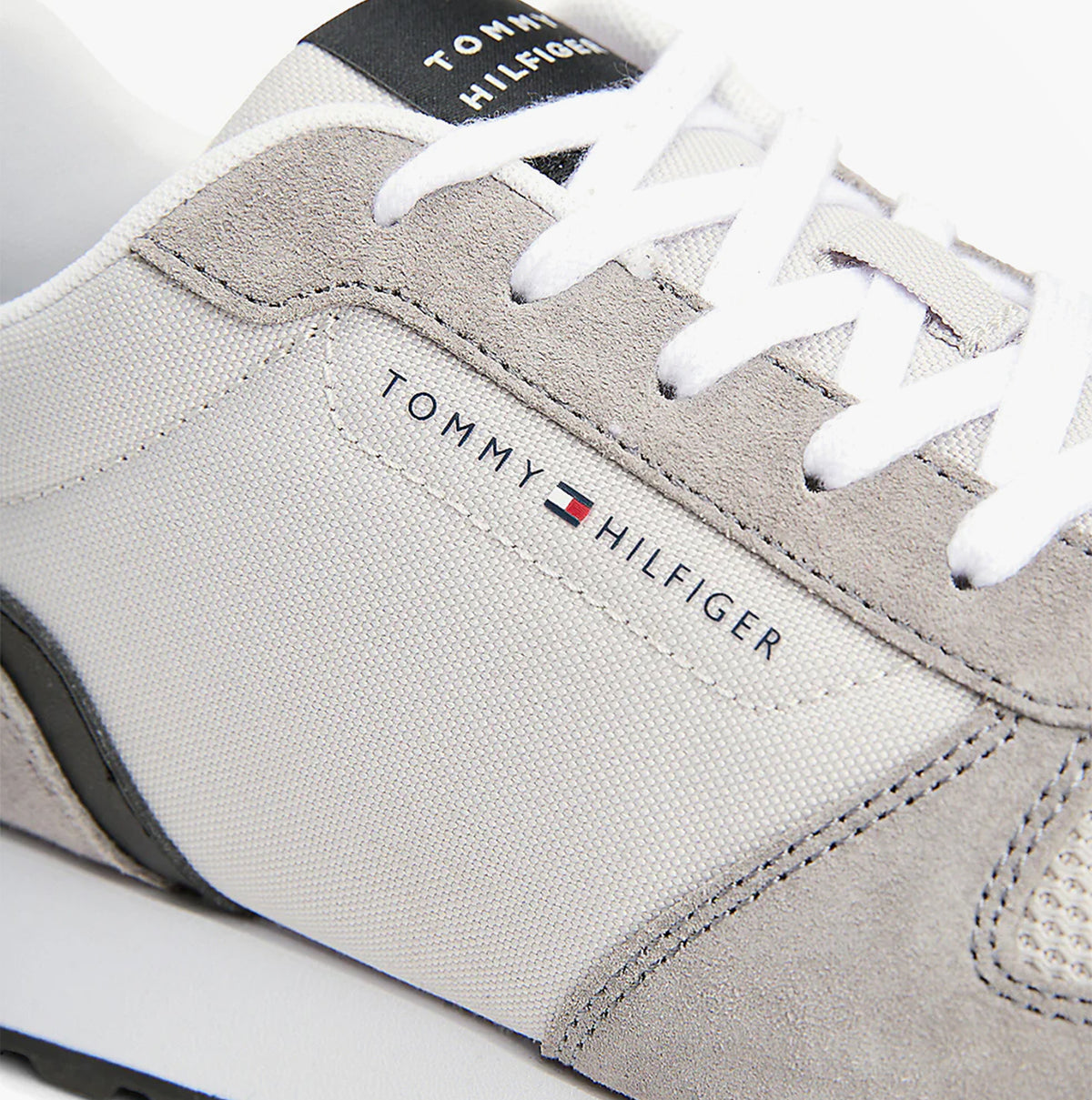 Tommy Hilfiger NEW RUNNER EVA MIX Mens Trainers Grey Whisper detail view showcasing suede and textile materials.