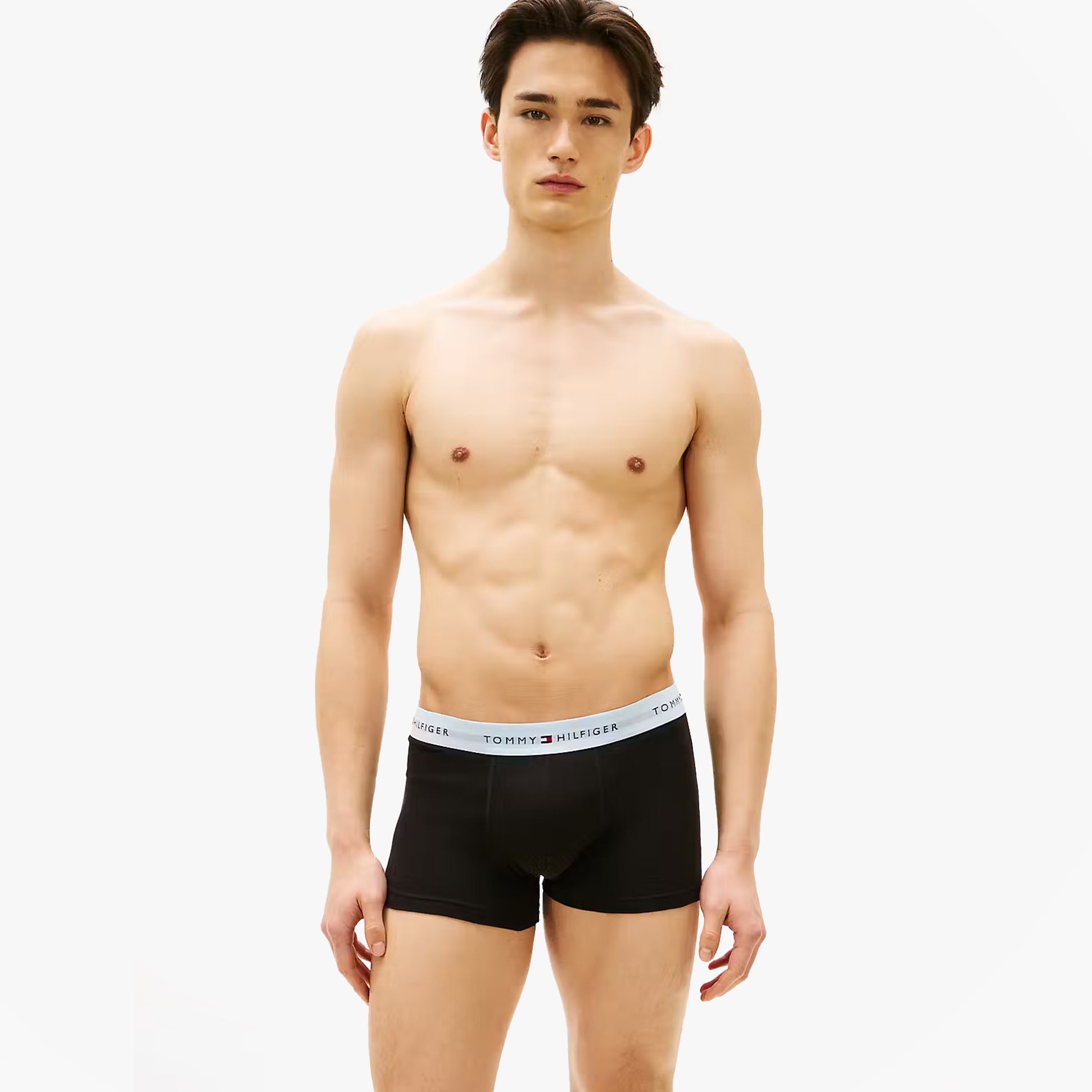 Tommy Hilfiger Mens 3 Pack Signature Repeat Logo Waistband Trunks black front view model wearing trunks
