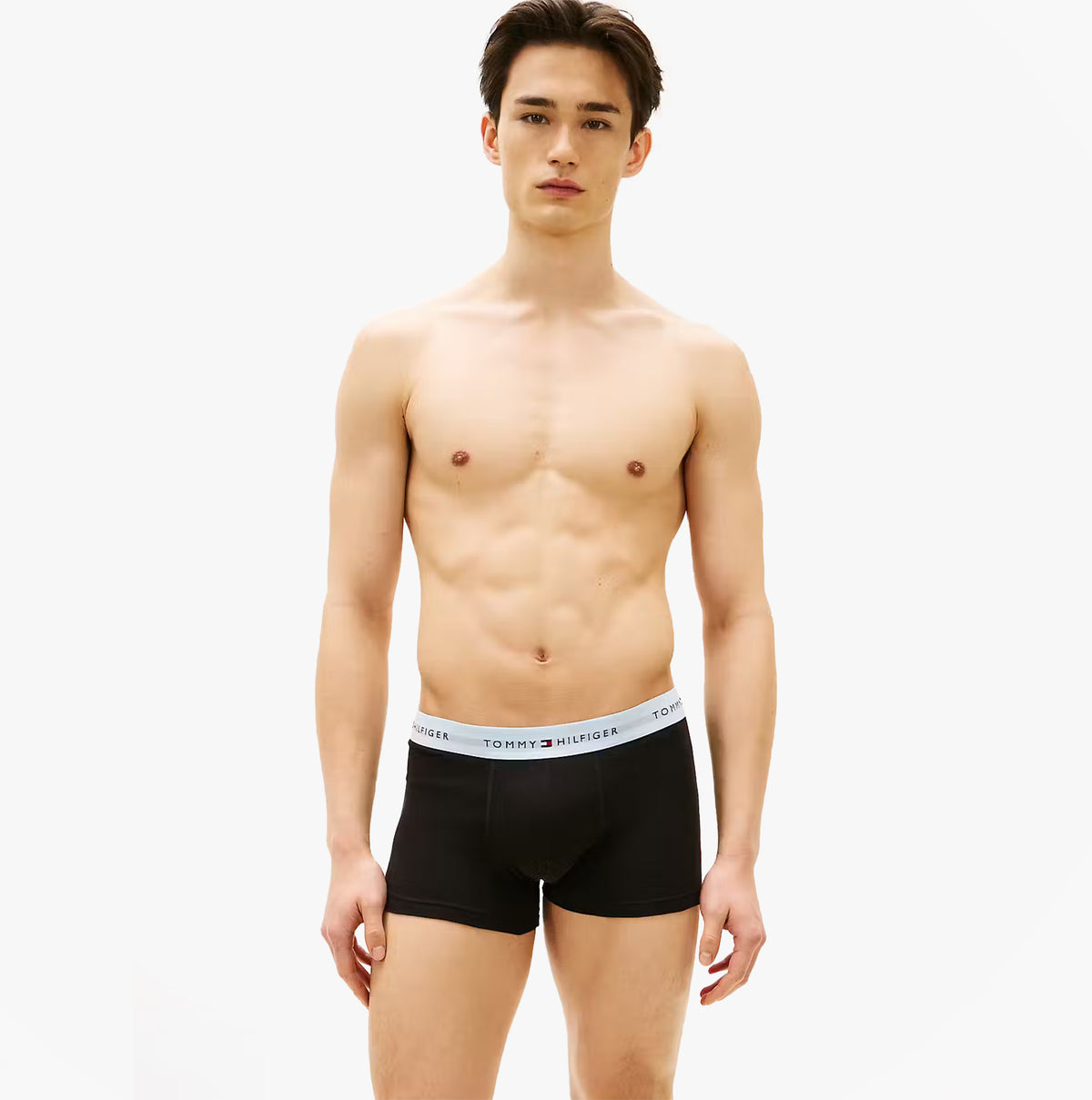 Tommy Hilfiger Mens 3 Pack Signature Repeat Logo Waistband Trunks black front view model wearing trunks