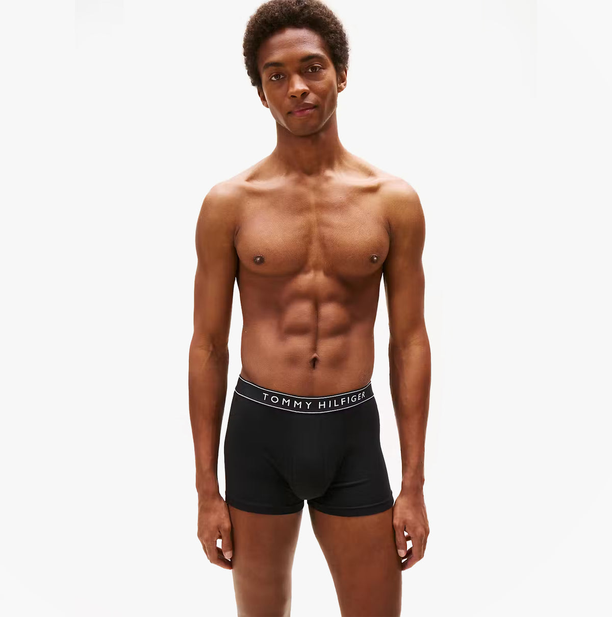 Tommy Hilfiger Mens 3 Pack Trunks Grey/Black/White front view model wearing black trunks