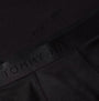 Detail view of Tommy Hilfiger Mens Boxer Briefs & T-Shirt Black showing the waistband logo.
