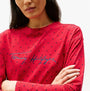 Tommy Hilfiger HERITAGE Womens Pyjama Set Hearts Primary Red Aop detail view of round neck and signature logo on chest.