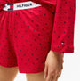 Tommy Hilfiger HERITAGE Womens Pyjama Set Hearts Primary Red Aop detail view showcasing the heart pattern and TH logo waistband.