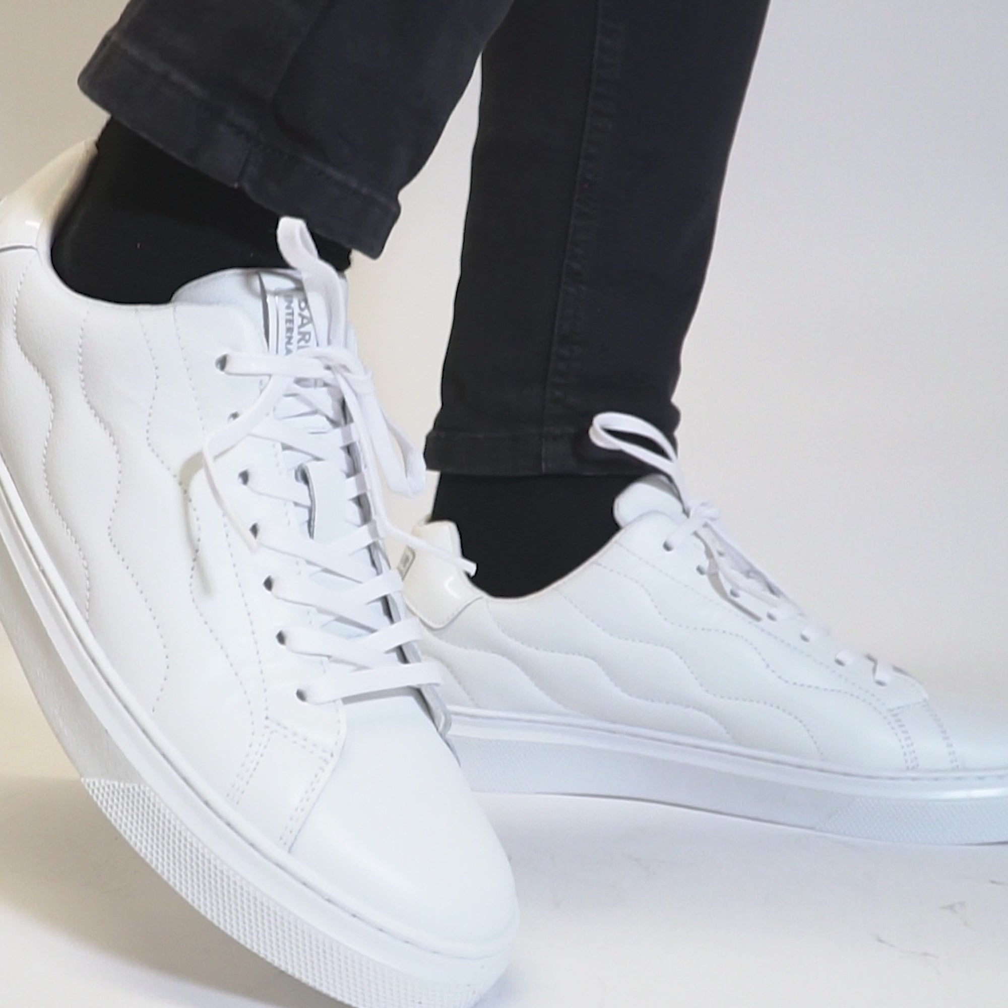 Barbour GLENDALE Mens Trainers White side view showing sleek leather upper and round toe design.